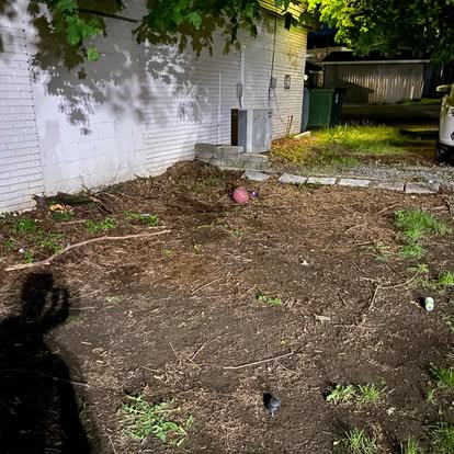 Cleared yard after Haul Hogs removed the junk pile